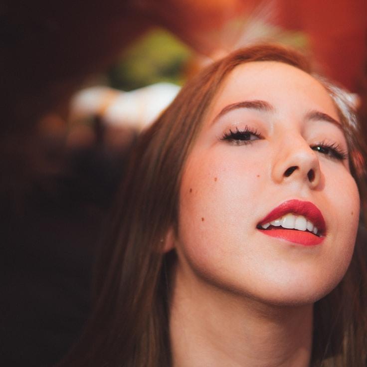 Alex M., Lead Design Curator at Harbor Ledger Trail, reviewing corporate floral arrangements